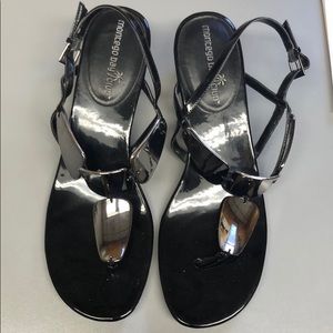 Cute black and silver wedges. Brand new w/o tags